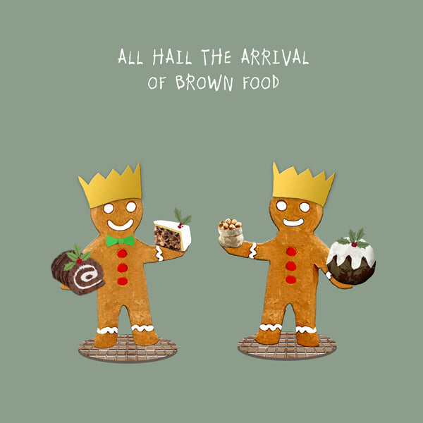 gingerbread men holding brown Christmas food with text: All hail the arrival of brown food